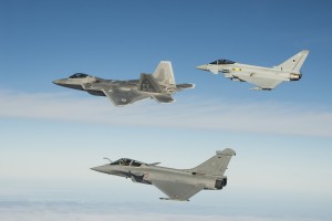 An F-22 flying with a Typhoon and a Rafael at the Trilateral Exercise at Langley AFB, December 2015. Credit Photo: USAF