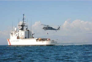 A Navy helicopter delivers humanitarian supplies to the USCG Cutter Mohawk off of Port-au-Prince January 15, 2010 (Credit Photo: USMC)