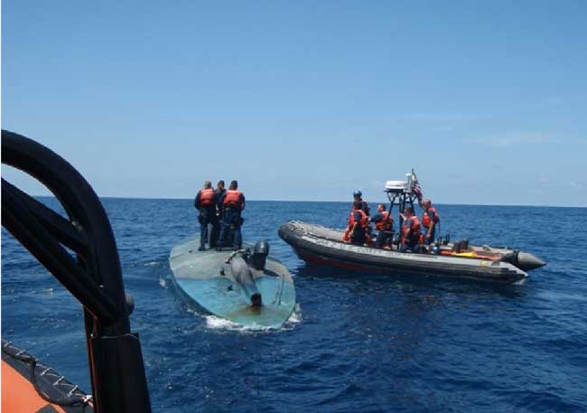 Finding a Semi-Submersible at Sea and Then Prosecuting Effectivley is a Challenging Task, Something the Drug Smugglers are Counting on for their Mission success. (Credit: USCG)