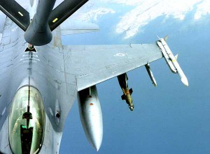 An F-16 Fighting Falcon connects with the refueling boom of a KC-135 Stratotanker. The refueling mission took place over Iraq, in support of Operation Iraqi Freedom. The KC-135 is part of the 340th Expeditionary Air Refueling Squadron, Southwest Asia, while the F-16 deployed from Hill Air Force Base, Utah, to Balad Air Base, Iraq. (Credit: US Central Command Air Forces 05/07/06)