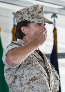 Marine Col. Laura Sampsel gives her final salute to her squadrons during the 33rd Maintenance Group change of command ceremony July 22 at Eglin Air Force Base, Fla. Col. Mark Fluker took command of the group from Sampsel. (Credit: USAF)