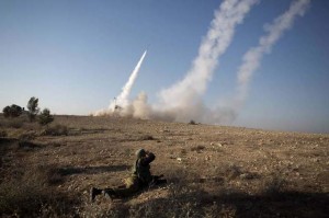 The Israeli military launches a missile Nov. 15 from the Iron Dome air defense system, designed to intercept and destroy incoming short-range rockets and artillery shells, in the southern city of Beer Sheva following the firing of rockets from the Gaza Strip. (Menahem Kahana / AFP) 