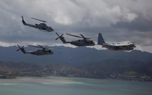 A Sumo KC-130J conducting refueling of  CH-53 aircraft over Hawaii. Credit: Sumos