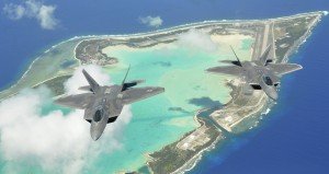 Two F-22 Raptors fly over Wake Island as part of a rapid deployment June 21, 2013. Twenty-nine members from the Air National Guard and active duty Air Force from Joint Base Pearl Harbor-Hickam teamed up to perform the deployment, conducted a site-survey for future contingency operations, and performed emergency response training with local contractors. (U.S. Air Force photo/Master Sgt. Connie Reed 