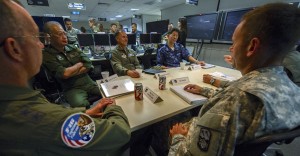 (From left) U.S. Air Force Brig. Gen. Paul McGillicuddy, Pacific Air Forces chief of staff, Japan Air Self-Defense Force Maj. Gen. Yutaka Masuko, Director of Defense Operations, Plans and Communications Directorate at the Air Defense Command Headquarters, Maj. Gen. Kevin Pottinger, Individual Mobility Augmentee to the Pacific Air Forces vice commander, and Japan Maritime Self-Defense Force Rear Adm. Ryo Sakai, Commander of Escort Flotilla 1 at Self-Defense Fleet, and U.S. Army Brig. Gen. Daniel Karbler, 94th Army Air Missile Defense commanding general, plan together during Integrated Air and Missile Defense Wargame V on Feb. 14, 2014, in the 613th Air Operations Center at Joint Base Pearl Harbor Hickam, Hawaii. The exercise provided opportunities to simulate integrated engagements between joint U.S. forces and Japan Self-Defense Forces, while aiming to promote missile defense interoperability. (U.S. Air Force photo by Staff Sgt. Nathan Allen) 