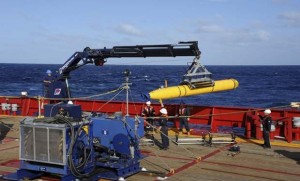 The Bluefin 21, Artemis autonomous underwater vehicle (AUV) is hoisted back on board the Australian Defence Vessel Ocean Shield after successful buoyancy testing in the Indian Ocean, as search efforts continue for missing Malaysia Airlines Flight 370. (Photo: AP)  