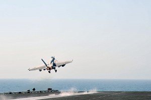 An F/A-18E Super Hornet assigned to the “Tomcatters” of Strike Fighter Squadron (VFA) 31 launches from the aircraft carrier USS George H.W. Bush (CVN 77). June 16, 2014. 
