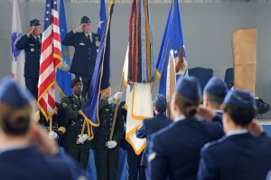 8/1/2010 - U. S. Air Force Lt .Gen. Dana Atkins, Alaskan Command commander and Air Force Col. Robert Evans, Joint Base Elmendorf-Richardson/673d Air Base Wing commander, pay respect to the colors presented by a joint color guard during the 673d ABW's July 30, 2010 activation ceremony, and Joint Base Elmendorf-Richardson, Alaska. (U.S. Air Force photo/Master Sgt. Jeremiah Erickson)