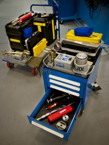 A cart full of more than 280 tools and equipment was previously required to complete brake and tire maintenance on a 33rd Fighter Wing F-35A. The new blue box created by the Airmen of the 58th Aircraft Maintenance Unit's Support Section reduces the amount of tools required by 81 percent. (U.S. Air Force photo/Samuel King Jr.) 4/3/13