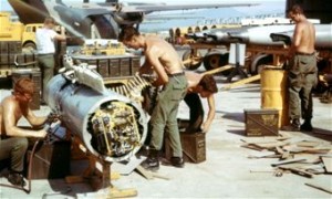 F-4Cs and F-4Ds did not have an internal gun. Some were equipped with an external gun pod. Here, armorers load 20mm cannon rounds into an F-4 gun pod. In the upper right corner are several complete gun pods. (U.S. Air Force photo)