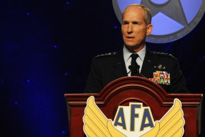 Gen. Mike Hostage, commander of Air Combat Command, speaks to the audience on the importance of maintaining combat capabilities with minimal resources during the Air Force Association's 2014 Air and Space Conference at the Gaylord National Convention Center in Washington, D.C., Sept. 16, 2014. Hostage is responsible for organizing, training and equipping combat-ready Airmen for peacetime and wartime defense. (U.S. Air Force photo by Staff Sgt. Matt Davis) 