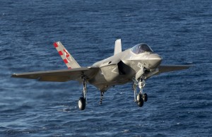 An F-35C Lightning II carrier variant joint strike fighter makes an arrested landing aboard the aircraft carrier USS Nimitz (CVN 68). An integrated global fleet of F-35s is a key asset for shaping joint and coalition capabilities for 21st century combat operations.  