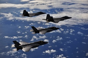 F-22 Raptors from the 94th Fighter Squadron, Joint Base Langley-Eustis, Virginia, and F-35A Lightning IIs from the 58th Fighter Squadron, Eglin Air Force Base, Florida, fly in formation after completing an integration training mission over the Eglin Training Range, Florida, Nov. 5, 2014. It was the first operational integration training mission for the Air Force’s fifth generation aircraft. The F-35s and F-22s flew offensive counter air, defensive counter air and interdiction missions together, employing tactics to maximize their fifth-generation capabilities. (U.S. Air Force photo/Master Sgt. Shane A. Cuomo) 