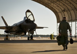 Lt. Col. Benjamin Bishop, the 422nd Test and Evaluation Squadron director of operations, walks toward an F-35A Lightning II at Eglin Air Force Base, Fla., March 6 for his first sortie in the new aircraft. Bishop is among the first pilots to begin the official training that began in January. Bishop and other 422nd TES pilots will begin operational testing of the joint strike fighter later this year at Nellis Air Force Base, Nev. (U.S. Air Force photo/Samuel King Jr.) 