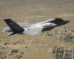 An F-35B Lightning II is shown over the Mojave Desert as it arrives for testing at Edwards AFB, CA in April 2014.  (Lockheed Martin photo by Dane Wiedmann.) 