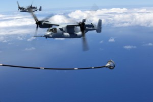 An MV-22B Osprey, with Marine Medium Tiltrotor Squadron 163, 11th Marine Expeditionary Unit, maneuvers into position to receive fuel en route to Hawaii, July 30th, 2014. Four Ospreys launched from the USS Makin Island and traveled more than 800 nautical miles to insert an element of Marines into a simulated Embassy compound. USMC, 7/30/14. 