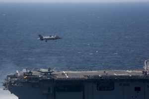 An F-35B Lightning II lands on the flight deck of the USS Wasp (LHD-1) during short take-off, vertical landing operations, May 20, 2015. No other fighter jet in the world is capable of a vertical landing or taking off from a 400 foot runway. (U.S. Marine Corps photo by Lance Cpl. Remington Hall/Released)