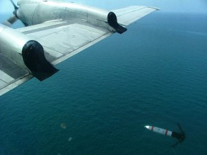 A MK 62 Quick Strike mine is deployed from the starboard wing of a P-3C Orion. Credit Photo: US Navy