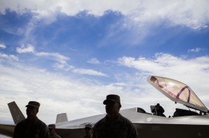Air Force Technical Sergeants stand before an F-35 during  the 34th Fighter Squadron activation ceremony, reclaiming its place in the 388th Fighter Wing, on Friday, July 17, 2015 on Hill Air Force Base. The 34th Fighter Squadron will become the first operational Air Force unit to fly combat-coded F-35s.