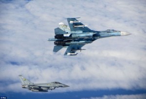 Aircraft from 3 (Fighter) Squadron, Commanded at the time by Wing Commander Ian Townsend Officer, are seen intercepting Russian aircraft as part of the NATO mission to police the airspace over the Baltics. The planes were ordered into the skies after four separate groups of aircraft were detected by Nato air defences in international airspace near to the Baltic states. The aircraft were subsequently identified as a Russian Tupolev Tu22 Backfire bomber, four Sukhoi Su27 Flanker fighters, one Beriev A50 Mainstay early-warning aircraft and an Antonov An26 Curl transport aircraft. Credit: The Daily Mail, June 18, 2014.