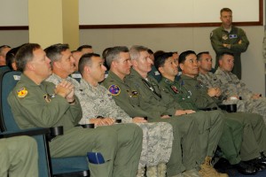 Exercise directors from participating countries for Exercise Cope North, including Group Captain Glen Beck (5th from left) from the RAAF listen to the opening briefs at Andersen Air Force Base in Guam. *** Local Caption *** Exercise Cope North Guam 2014 (CNG14), conducted from 14 - 28 February 2014, is a Commander Pacific Air Forces sponsored, multilateral field training exercise with the United States Air Force (USAF), Japan Air Self-Defence Force (JASDF), and the Royal Australian Air Force (RAAF). Conducted from Andersen Air Force Base, Guam, CNG14 involves a large force employment Air Combat Exercise with Dissimilar Air Combat Training and a Humanitarian Assistance and Disaster Relief (HA/DR) exercise which runs concurrently but with separate exercise scenarios.CNG14 involves over 1000 personnel and 80 aircraft and is designed to increase the combat readiness and interoperability of the USAF, JASDF and RAAF. The HA/DR exercise focuses training on coordination of disaster relief efforts, in particular medical support and aero-medical evacuations. 