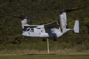 An MV-22 Osprey with Marine Operational Test and Evaluation Squadron 22 (VMX-22) departs from Marambaia Island, Brazil, after tactically inserting Marines and Sailors with Special Purpose Marine Air Ground Task Force South, Aug. 4, 2014. The plane deployed from the USS America during its maiden voyage. (U.S. Marine Corps Photo by Cpl. Donald Holbert/ Released) 