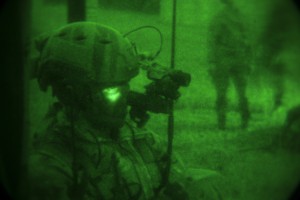 An Air Force joint terminal attack controller participates in a raid conducted by Maritime Raid Force, 31st Marine Expeditionary Unit, Dec. 14, 2015. The JTAC’s acted as the eyes on the ground for aircraft supporting the raid. The raid was part of Interoperability Exercise 16-1, an exercise used to build a working bond between MRF and the rest of the MEU quickly and effectively. (U.S. Marine Corps Photo by Cpl. Thor J. Larson/Released) 
