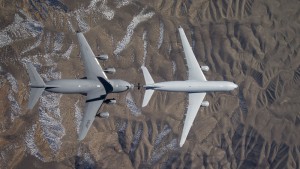 A Royal Australian Air Force (RAAF) KC-30A Multi-Role Tanker Transport (MRTT) refuels a United States Air Force C-17A Globemaster III transport. *** Local Caption *** On 10 February 2016, a RAAF KC-30A Multi-Role Tanker Transport (MRTT) conducted its first air-to-air refuelling with a C-17A Globemaster III transport, flying from Edwards Air Force Base in California. The five-hour sortie saw 39 contacts between the KC-30A and C-17A aircraft, with approximately 6,800 kilograms of fuel transferred to the C-17A via the KC-30As Advanced Refuelling Boom System (ARBS). The trial is part of a series of flights being made by a KC-30A with a range of USAF aircraft, and is a precursor to refuelling the RAAF's own C-17As in the near future. 