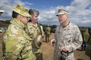 Australian Army soldiers Lieutenant Colonels Berni White and Stuart Mallett talk with US Marine Corps officer Lieutenant General Jon Davis at the range during Exercise Jericho Dawn at Puckapunyal, Victoria, on 18 March 2016. *** Local Caption *** The Royal Australian Air Force (RAAF) and the Australian Army, with support from Northrop Grumman, have successfully conducted a firepower demonstration and a combat team quick attack demonstration at Puckapunyal Military Area in Victoria as part of Exercise Jericho Dawn to display the powerful effects of integrated air and land operations. The live fire exercise allowed RAAF and Army operators, together with Defence and Industry representatives, to observe the combined air and land capabilities in two scenarios. The operators demonstrated the current capabilities, before trialling new ways to improve air-land integration, including the way that aircraft and vehicles connect and translate information through different communication networks. 