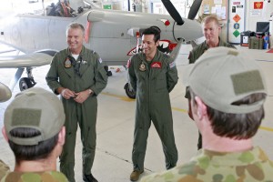 (L-R) Commander Air Combat Group, Air Commodore Anthony Grady, No. 82 Wing Officer Commanding, Group Captain Geoffrey Harland and No. 4 Squadron Commanding Officer, Wing Commander Stuart Bellingham chat with newly promoted Combat Controllers during the remuster ceremony. Mid Caption: Members of No. 4 Squadron's B Flight were officially remustered to Air Force's newest mustering 'Combat Controller' and six promoted to Sergeant in a small ceremony at RAAF Base Williamtown on 19 October 2012. The members are the first to be officially remustered to the new category which was approved for stand up by Chief Air Force on 19 March 2012. Prior to remustering, the members were a part of the Special Tactics Project which was later absorbed into Forward Air Control Development Unit and subsequently, the new No. 4 Squadron which was reformed by the then Chief Air Force, Air Marshal Mark Binskin on 3 July 2009. 