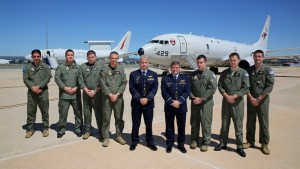On the hardstand in front of the US Navy P-8A Poseidon maritime surveillance aircraft and a No. 2 Squadron (2 SQN) E-7 Wedgetail is Commander Surveillance and Reconnaissance Group (SRG) Air Commodore Chris Westwood (fourth from right), Officer Commanding No. 92 Wing Group Captain Craig Heap (fifth from left), Commanding Officer 2 SQN Wing Commander Paul Carpenter and 2 SQN aircrew. *** Local Caption *** A Press Conference was held, on 21 Feb 2014 at Defence Establishment Fairbairn, to announce the Government's approval for the acquisition of eight P-8A Poseidon maritime surveillance aircraft. The announcement was made by the Prime Minister, The Hon. Tony Abbott MP, with the support of the Minister for Defence, Senator The Hon. David Johnson, the Chief of Air Force, Air Marshal Geoff Brown, AO and the United States Ambassador, John Berry. These state-of-the-art aircraft will dramatically boost Australias ability to monitor its maritime approaches and patrol over 2.5 million square kilometres of our marine jurisdiction. These aircraft will work closely with other existing and future ADF assets, and the Australian Customs and Border Protection Service aviation fleet, to secure our ocean resources and protect our borders. Prior to making the announcement the Prime Minister and Minister for Defence inspected a visiting US Navy P-8A aircraft currently in Australia for joint exercises with the Royal Australian Air Force and Royal Australian Navy. 