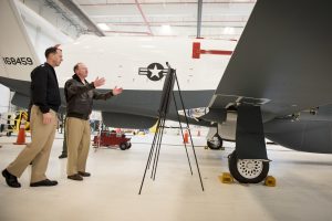 160113-N-AT895-251 PATUXENT RIVER Md. (Jan. 13, 2016) Chief of Naval Operations (CNO) Adm. John Richardson views the MQ-4C Triton unmanned aircraft system at Naval Air Station Patuxent River. Richardson also held an all-hands call, toured facilities and viewed aircraft and systems including the E-2D Advanced Hawkeye and F-35C Lightning II carrier variant joint strike fighter . (U.S. Navy photo by Mass Communication Specialist 1st Class Nathan Laird/Released) 