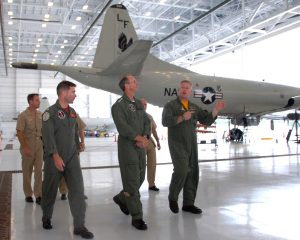 090629-N-3013W-041 JACKSONVILLE, Fla. (June 29, 2009) Cmdr. Anthony Corapi, commanding officer of Patrol Squadron (VP) 16, left, and Cmdr. James R. Debold, assigned to Patrol and Reconnaissance Wing 11, give Admiral Jonathan W. Greenert, commander U.S. Fleet Forces Command, a tour of Naval Air Station Jacksonville's newly finished Hangar 511. The $127 million, 277,000 square-foot building is the largest hangar of its kind in the Navy. (U.S. Navy photo by Mass Communication Specialist 2nd Class Charles E. White/Released) 