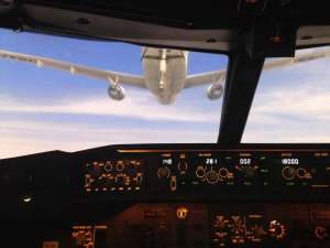 P-8 crew flying the Wedgetail simulator in Australia for refueling operations. 