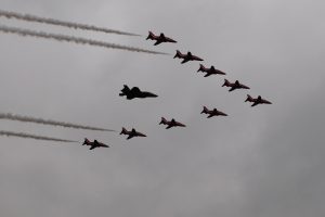 An F-35B Lighting II participates in a flyover with the Royal Air Force Aerobatic Team, the Red Arrows, during the first day of the Farnborough International Air Show, July 11, 2016. Participation in this premier event highlights the strength of the U.S. commitment to the security of Europe and demonstrates that U.S. industry is producing equipment that will be critical to the success of current and future military operations. (U.S. Air Force photo by Master Sgt. Eric BurksAn F-35B Lighting II participates in a flyover with the Royal Air Force Aerobatic Team, the Red Arrows, during the first day of the Farnborough International Air Show, July 11, 2016. Participation in this premier event highlights the strength of the U.S. commitment to the security of Europe and demonstrates that U.S. industry is producing equipment that will be critical to the success of current and future military operations. (U.S. Air Force photo by Master Sgt. Eric Burks/Released)An F-35B Lighting II participates in a flyover with the Royal Air Force Aerobatic Team, the Red Arrows, during the first day of the Farnborough International Air Show, July 11, 2016. Participation in this premier event highlights the strength of the U.S. commitment to the security of Europe and demonstrates that U.S. industry is producing equipment that will be critical to the success of current and future military operations. (U.S. Air Force photo by Master Sgt. Eric Burks/Released)An F-35B Lighting II participates in a flyover with the Royal Air Force Aerobatic Team, the Red Arrows, during the first day of the Farnborough International Air Show, July 11, 2016. Participation in this premier event highlights the strength of the U.S. commitment to the security of Europe and demonstrates that U.S. industry is producing equipment that will be critical to the success of current and future military operations. (U.S. Air Force photo by Master Sgt. Eric Burks/Released)An F-35B Lighting II participates in a flyover with the Ro 