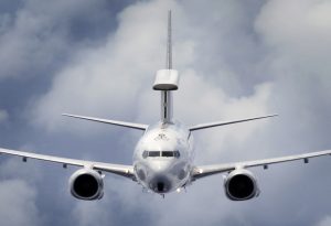 A No. 2 Squadron E-7A Wedgetail aircraft soars through the clouds on a training sortie. 