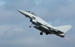 An RAF Typhoon fighter takes off from Amari air base in Estonia. CREDIT: JASON ALDEN. The Telegraph.