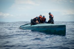 A Coast Guard Cutter Stratton boarding team member inspects the bridge of a self-propelled semi-submersible interdicted in international waters off the coast of Central America, July 19, 2015. The Stratton’s crew recovered more than six tons of cocaine from the 40-foot vessel. (Coast Guard photo courtesy of Petty Officer 2nd Class LaNola Stone) 