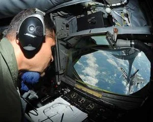 Chief Master Sgt. Daniel Michener refuels an F-16CJ Fighting Falcon from Shaw Air Force Base, S.C., during a large force exercise May 2, 2011, over North Carolina. Chief Michner is a 911th Air Refueling Squadron boom operator. (Credit: U.S. Air Force photo/Senior Airman Gino Reyes)